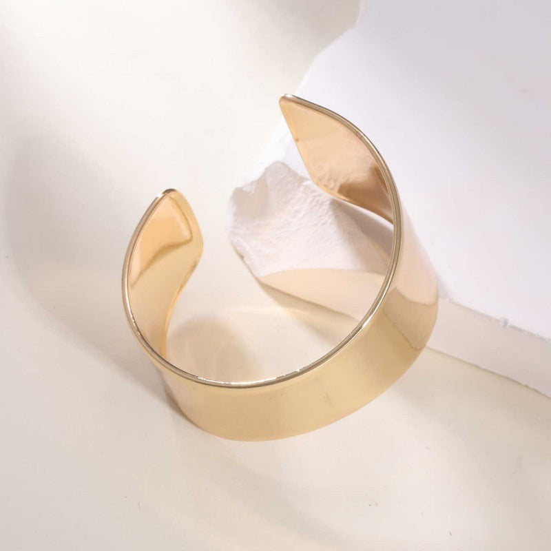 Women's Open Bangle with Elegant Wave Design Tom Cottons