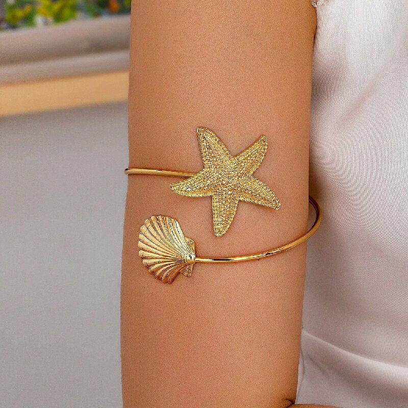 Women Open Bangle with Maritime Star and Shell Design Tom Cottons
