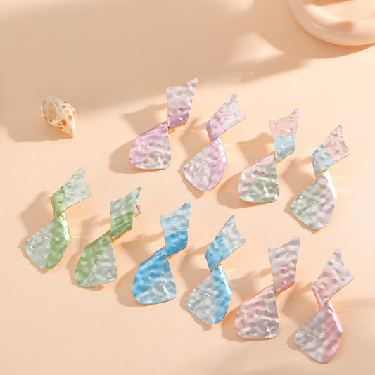 Ladies earrings in modern disc design Tom Cottons