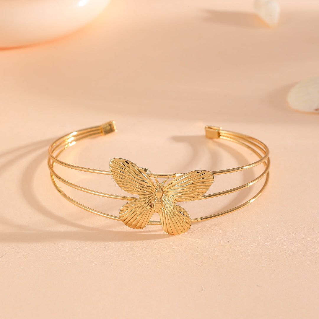 Women's bracelet with intricate bow design Tom Cottons