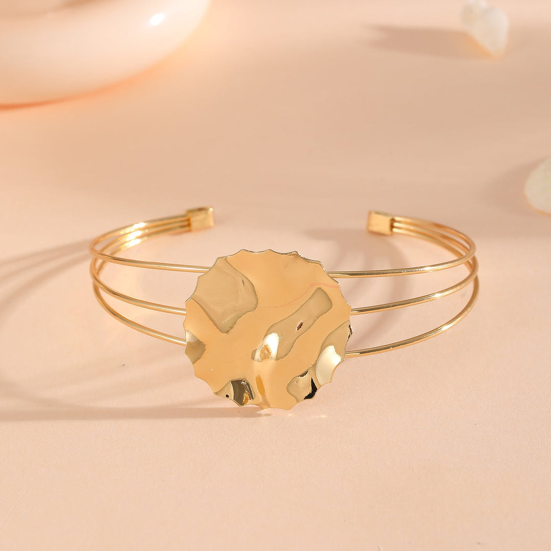 Women's bracelet with intricate bow design Tom Cottons