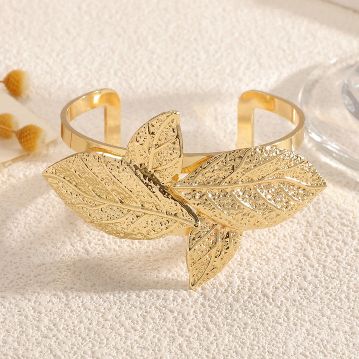 Ladies' bangle with artistic leaf design Tom Cottons