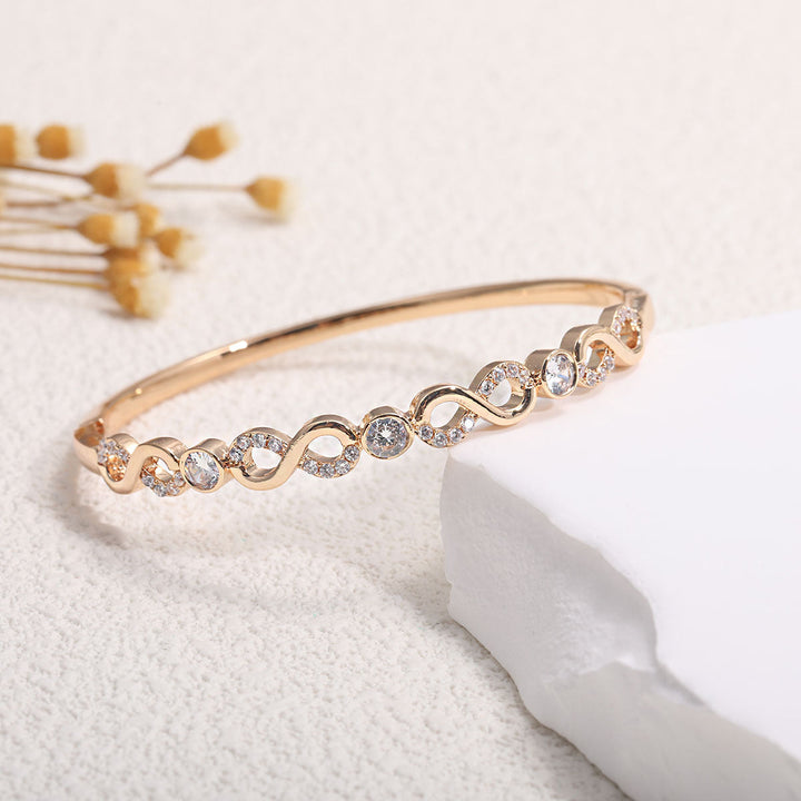 Ladies bracelet with elaborate infinity symbol and sparkling zirconia Tom Cottons