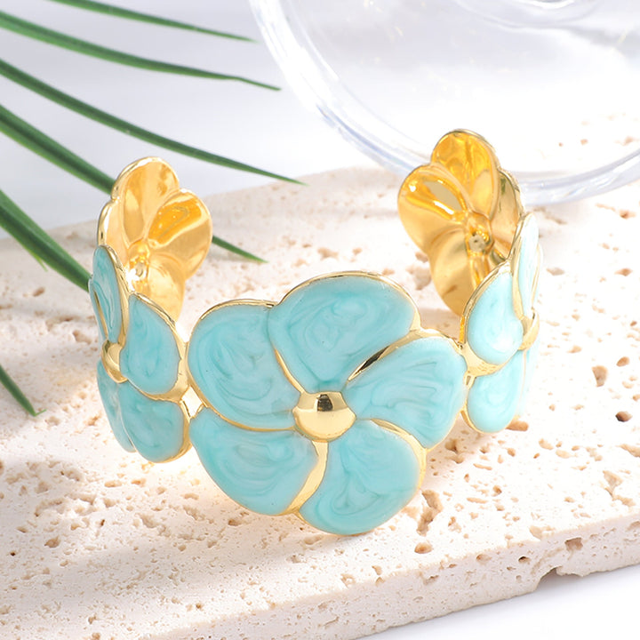 Ladies cuff bracelet with elaborate flower pattern Tom Cottons