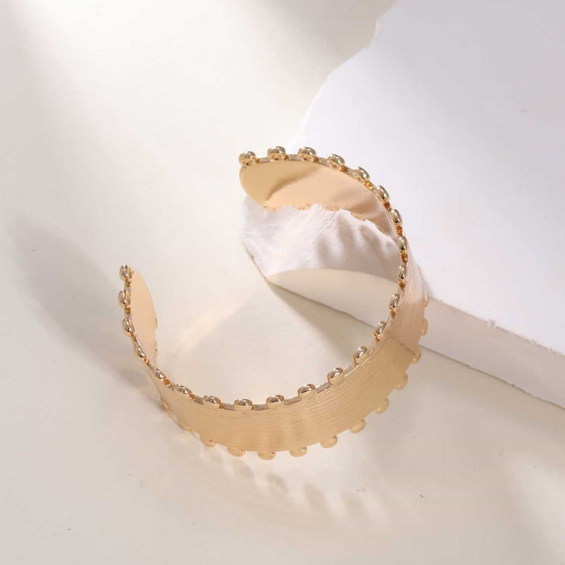 Women's Open Bangle with Elegant Wave Design Tom Cottons