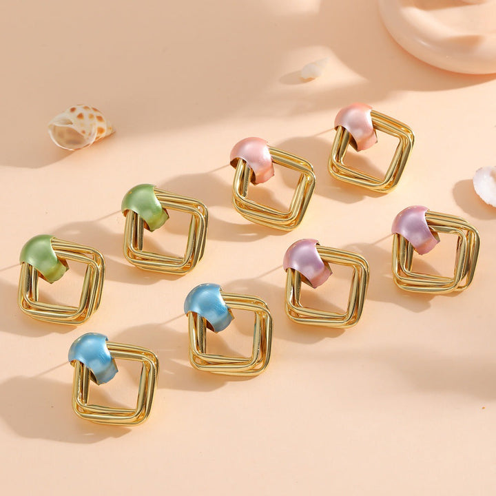 Women modern earrings with asymmetrical design Tom Cottons
