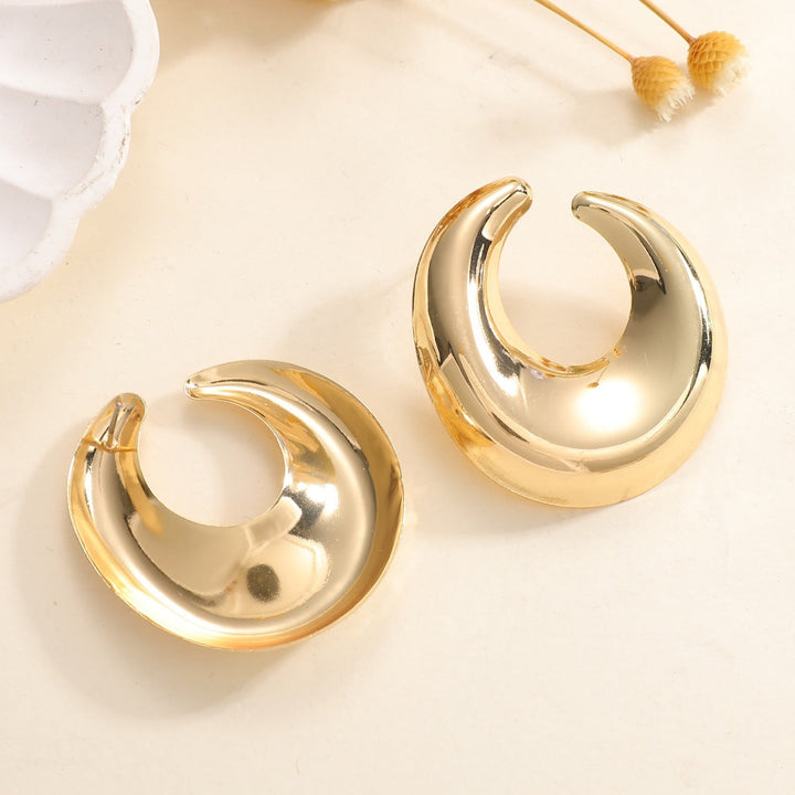 Women's earrings with elegant curved design Tom Cottons