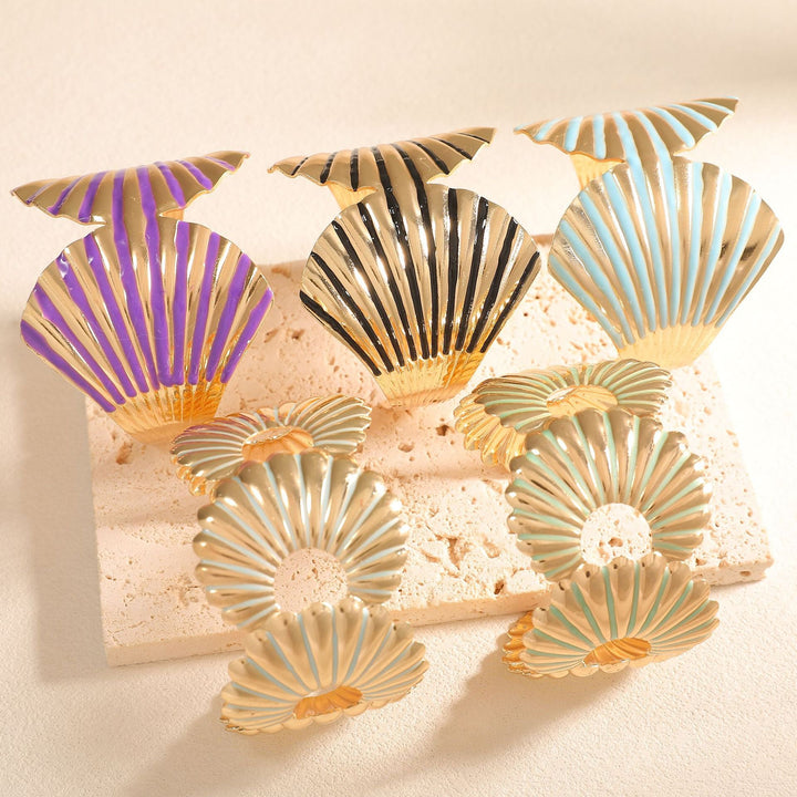 Women's bangle with elegant shell design Tom Cottons