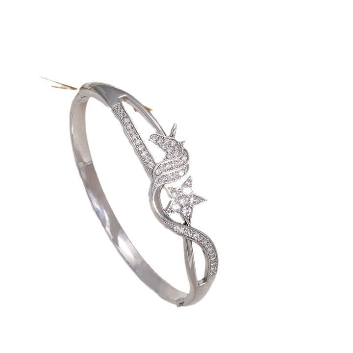 Ladies bracelet with elaborate infinity symbol and sparkling zirconia Tom Cottons