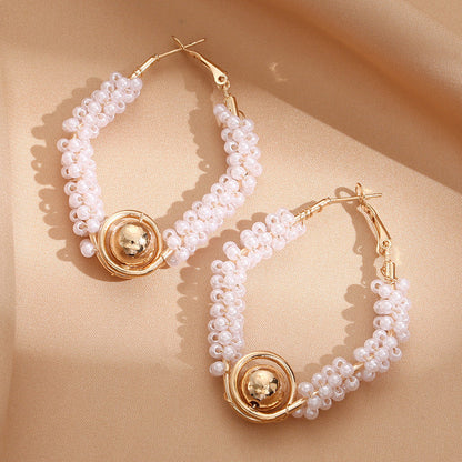 Women’s hoops with artistic pearl design Tom Cottons
