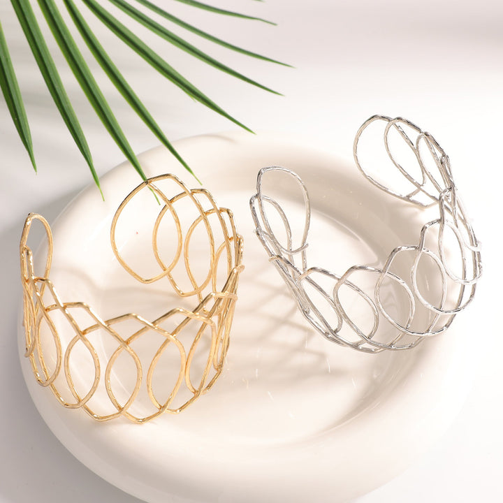 Women Open Bangle with Artfully Curved Design Tom Cottons