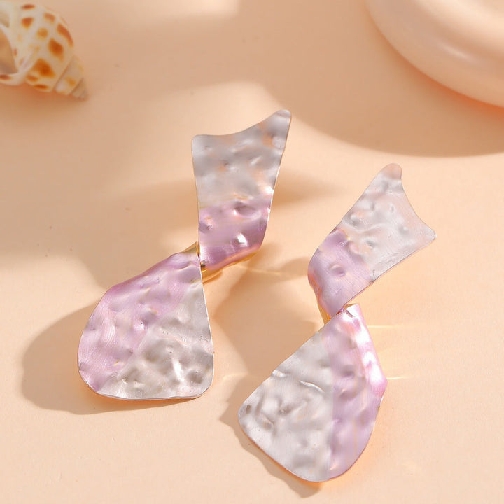 Ladies earrings in modern disc design Tom Cottons