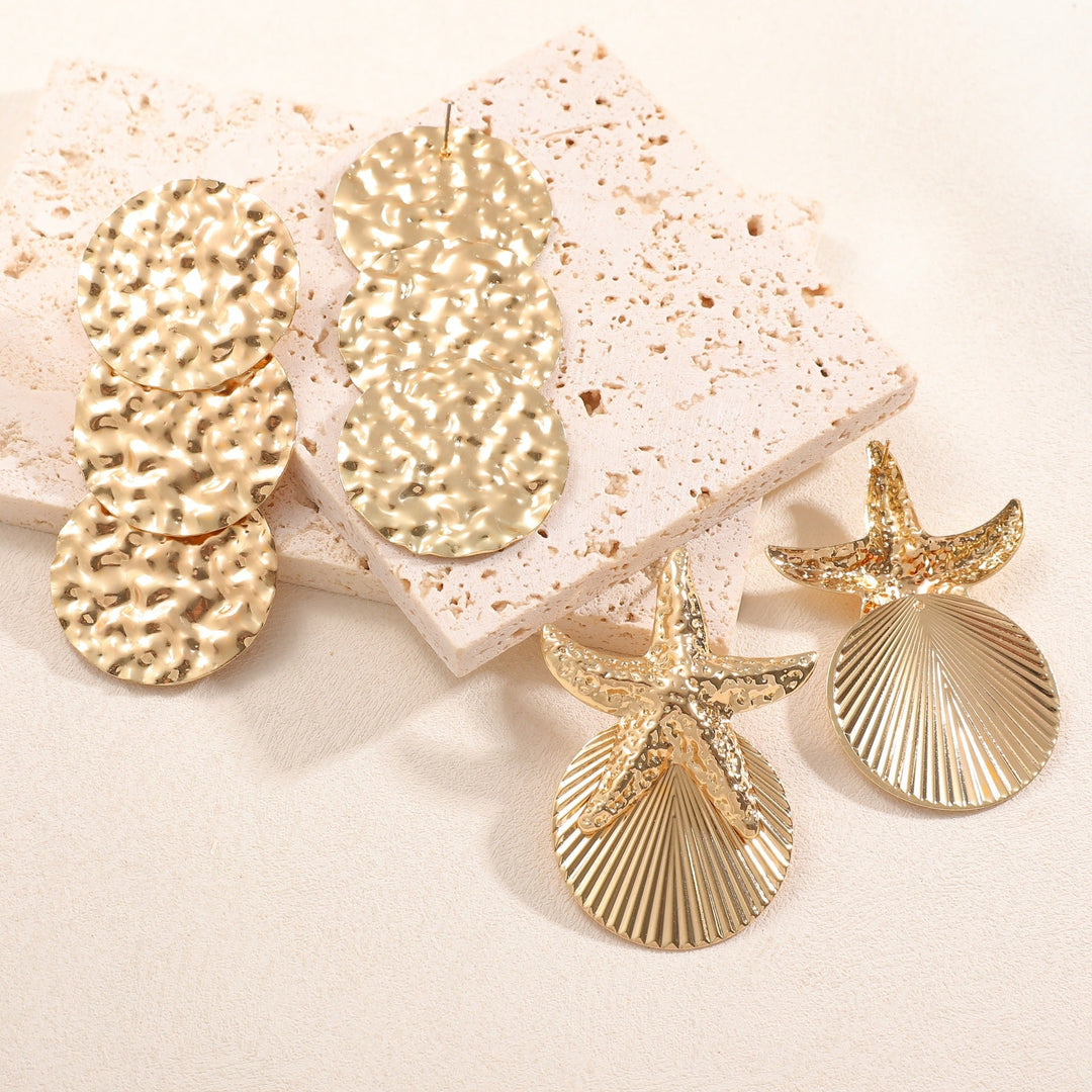Women's ear clips in luxurious shell and starfish design Tom Cottons