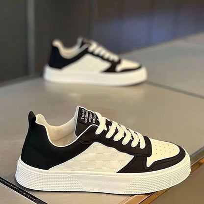 Women's stylish sneakers made of synthetic leather with trendy check pattern