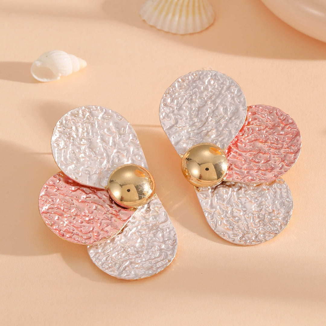 Women's ear clips in elaborate floral pattern Tom Cottons