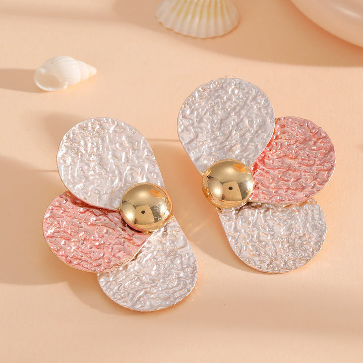 Women's ear clips in elaborate floral pattern Tom Cottons