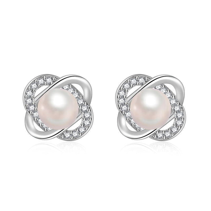 Ladies earrings with artistic pearl design and sparkling zirconia Tom Cottons