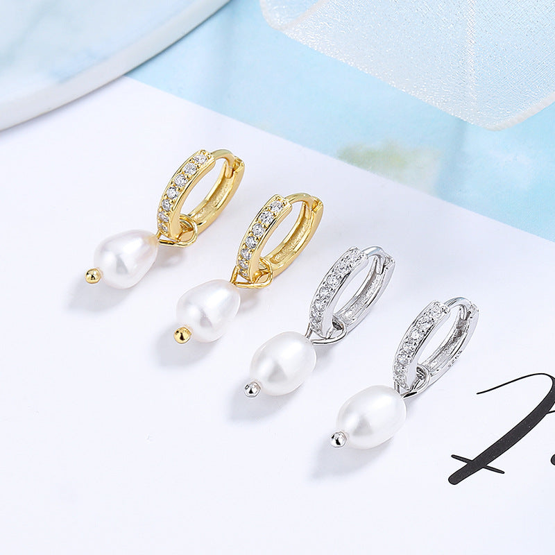 Ladies earrings with elegant zirconia decorations and pearl pendants Tom Cottons
