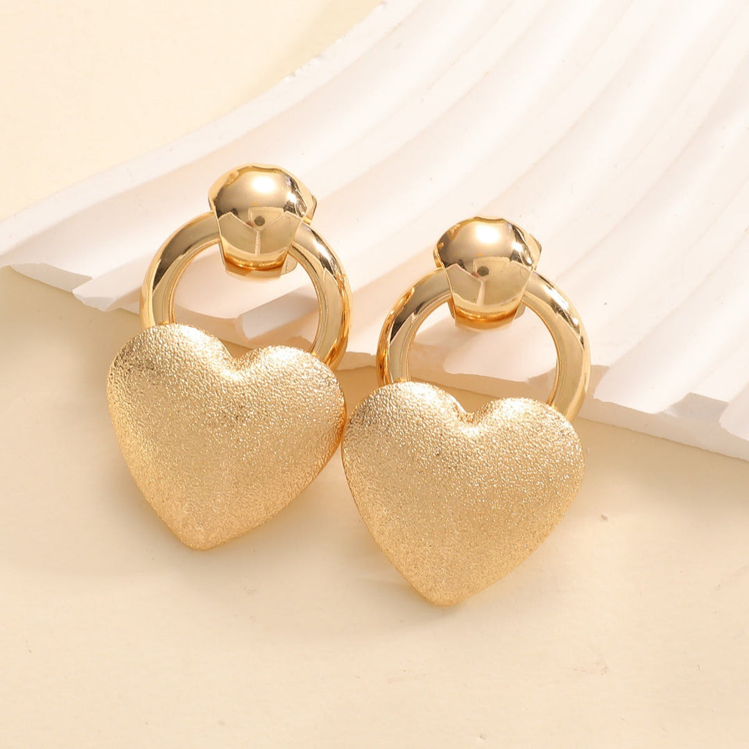 Ladies earrings in elegant heart design Tom Cottons