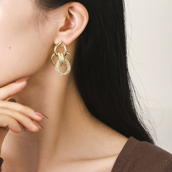 Women's Hanging Earrings with Luxurious, Sculptural Design Tom Cottons