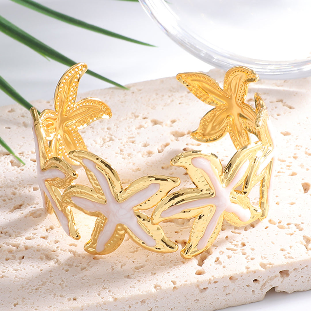 Ladies Open Cuff Bracelet with Expressive Star Motif Tom Cottons