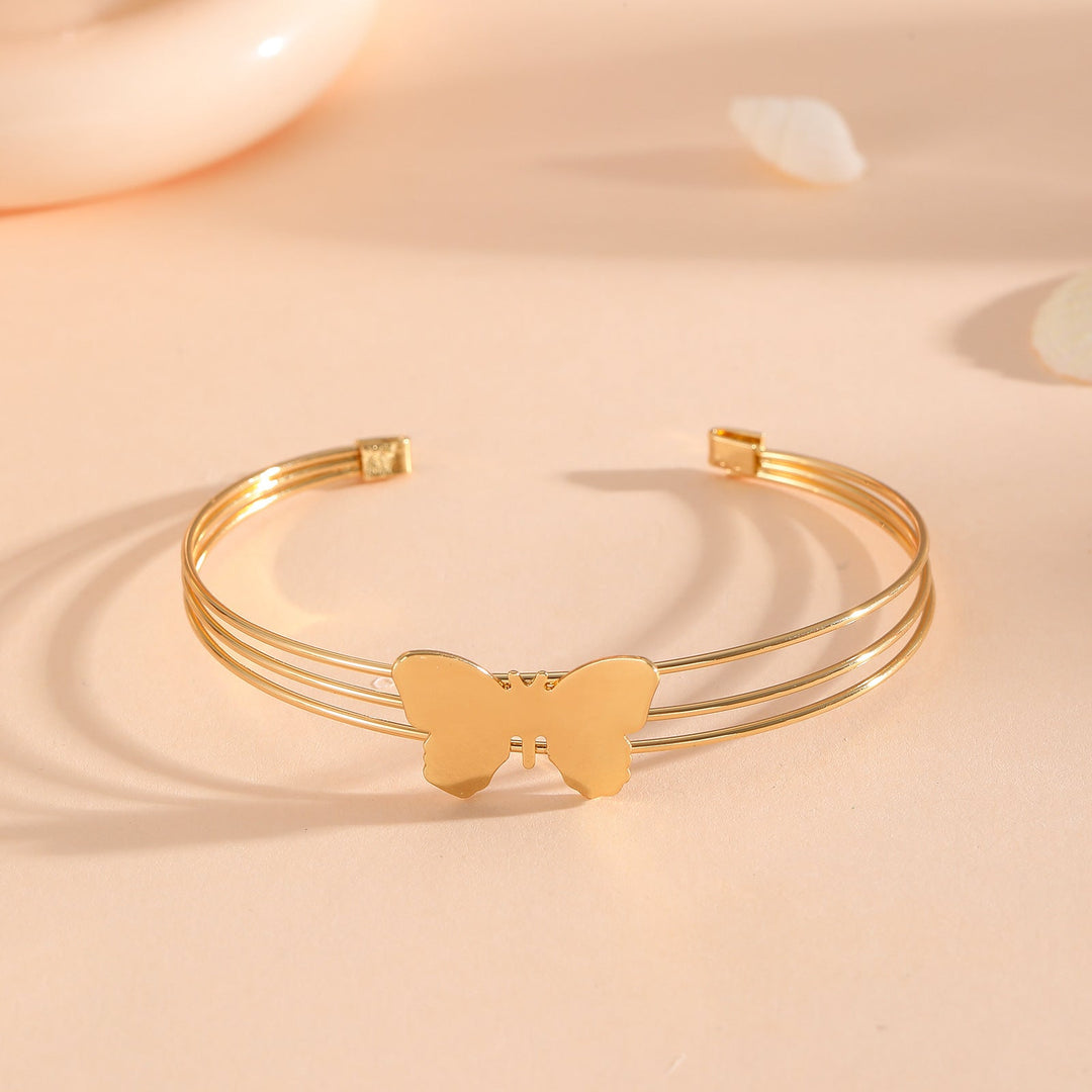 Women's bracelet with intricate bow design Tom Cottons