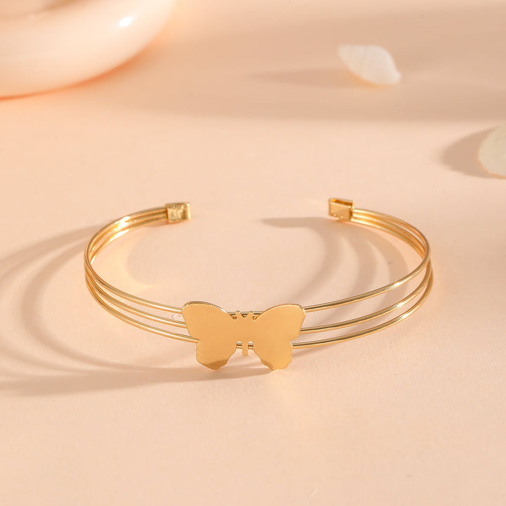 Women's bracelet with intricate bow design Tom Cottons