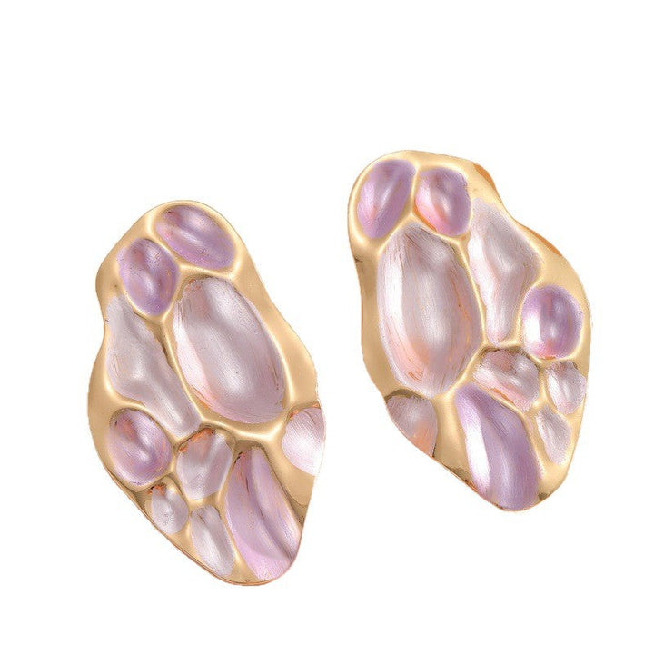 Ladies ear clips with elaborate, colorful shell design Tom Cottons