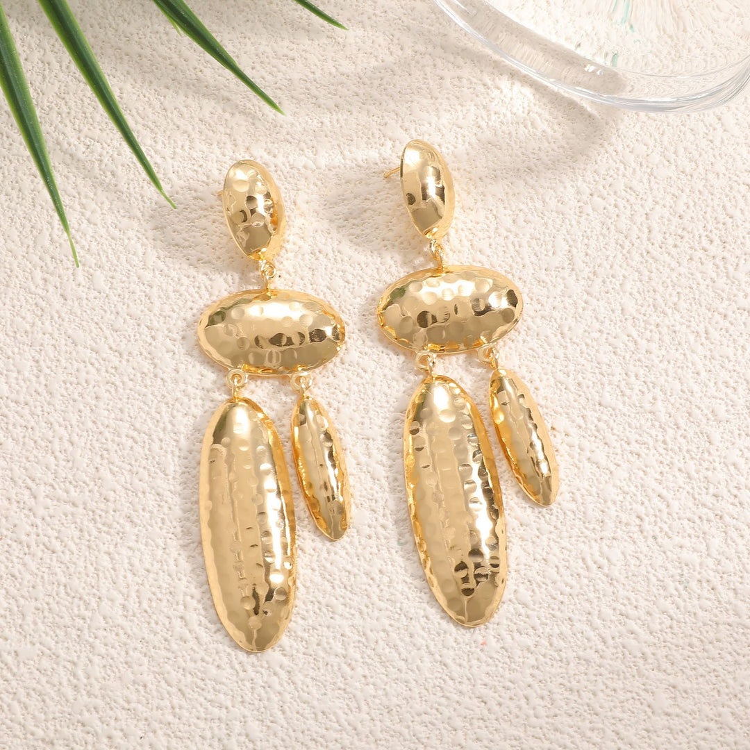 Women Hanging Earrings with artistic, three-dimensional design Tom Cottons