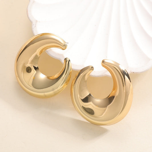 Women's earrings with elegant curved design Tom Cottons