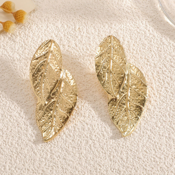 Ladies' bangle with artistic leaf design Tom Cottons
