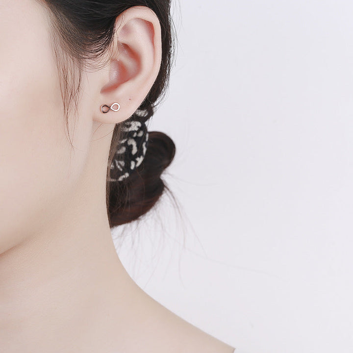 Ladies earrings in infinity design made of high-quality material Tom Cottons