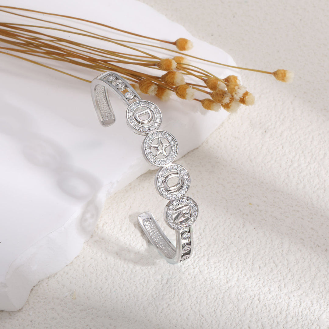 Ladies bracelet with elaborate infinity symbol and sparkling zirconia Tom Cottons
