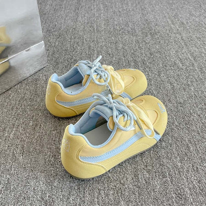 Women's sporty sneakers with innovative lacing and colorful design