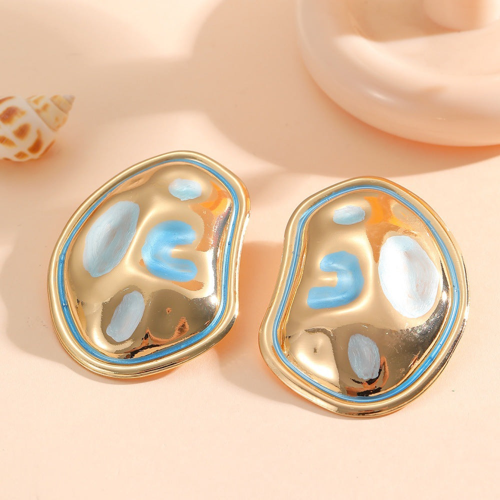 Ladies Hanging Earrings in a modern, organic design Tom Cottons