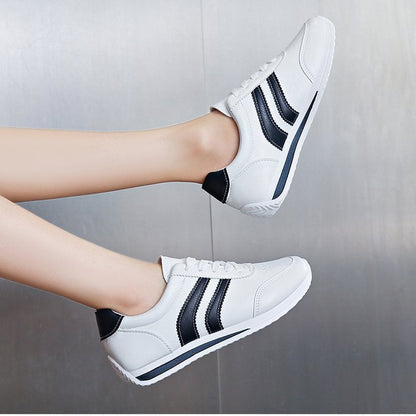 Women classic sneakers with stylish stripes