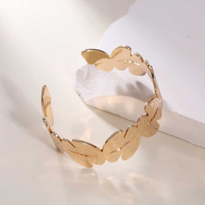Women's Open Bangle with Elegant Wave Design Tom Cottons