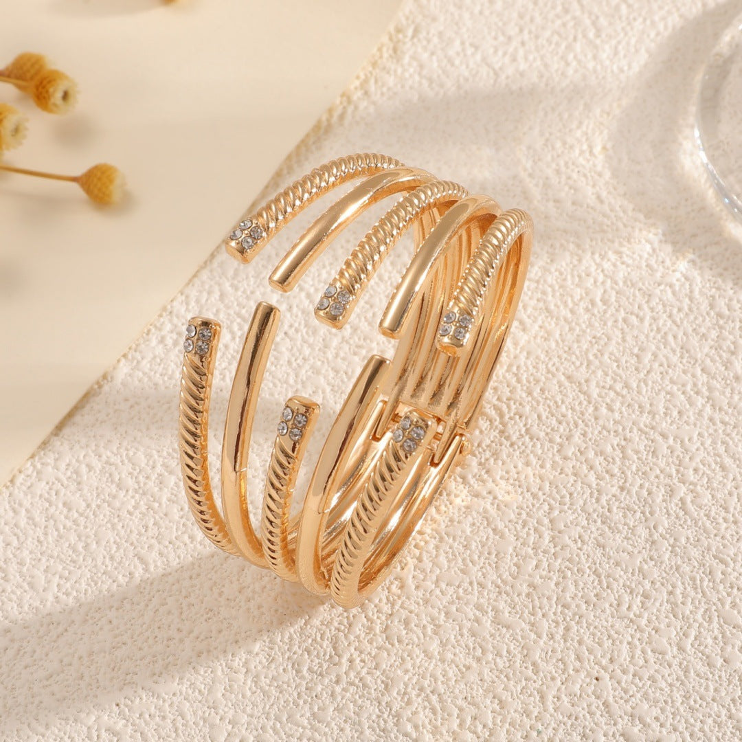 Women's Open Bangle with Modern, Layered Design Tom Cottons