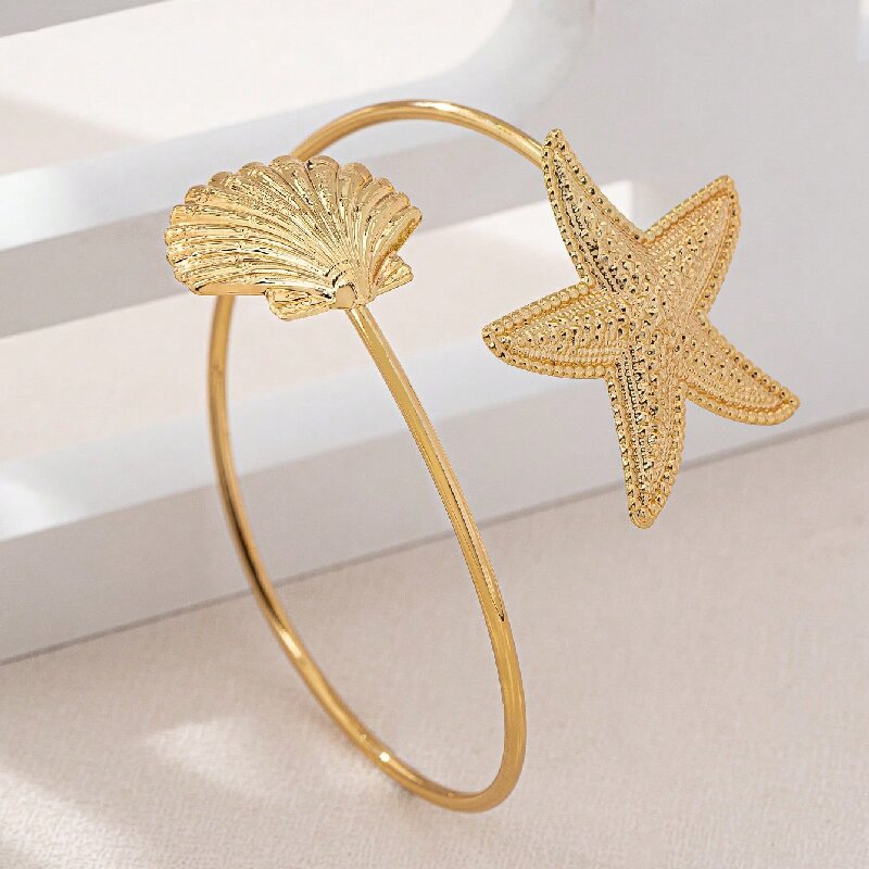 Women Open Bangle with Maritime Star and Shell Design Tom Cottons