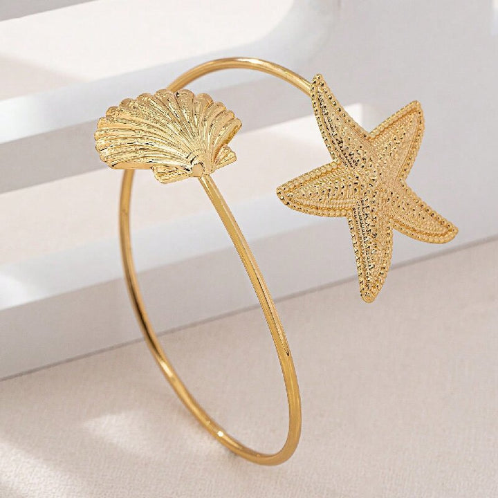 Women Open Bangle with Maritime Star and Shell Design Tom Cottons