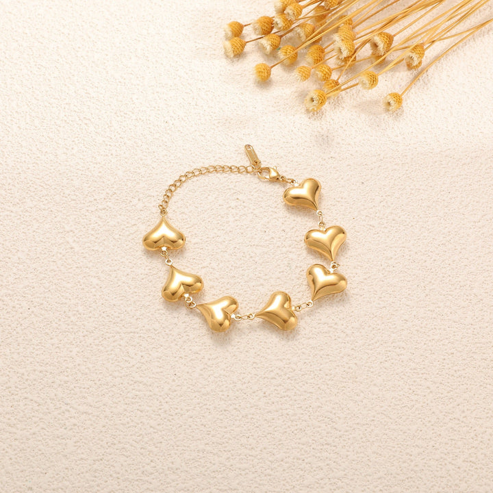 Ladies' bracelet with elegant heart design and fine link chain Tom Cottons