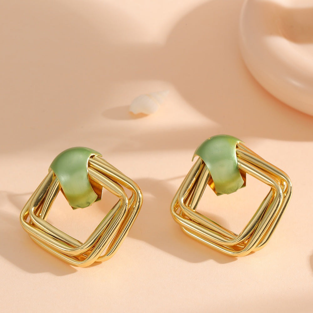 Women modern earrings with asymmetrical design Tom Cottons