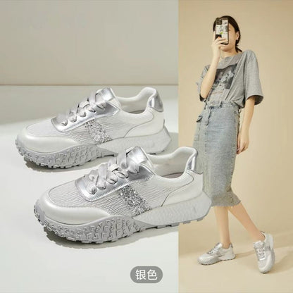 Women's sporty sneakers with sparkling accents and futuristic design